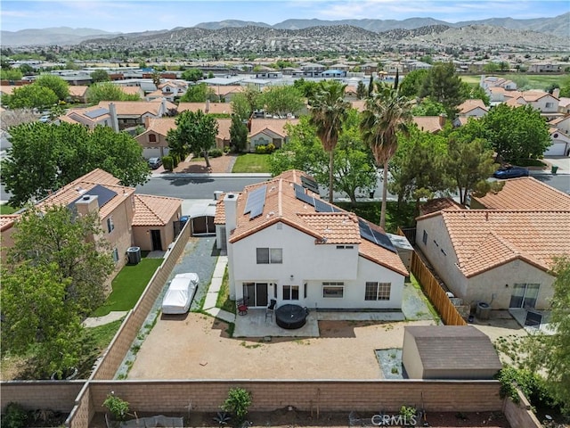 drone / aerial view with a mountain view and a residential view
