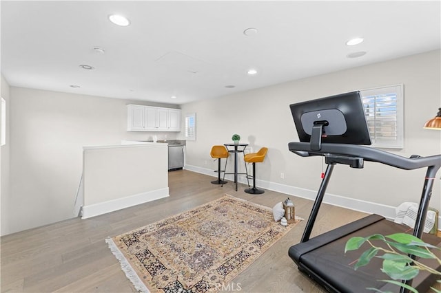 129 Pathway, Irvine, CA 92618 - exercise room with healthy amount of natural light, recessed lighting, light wood finished floors, and baseboards