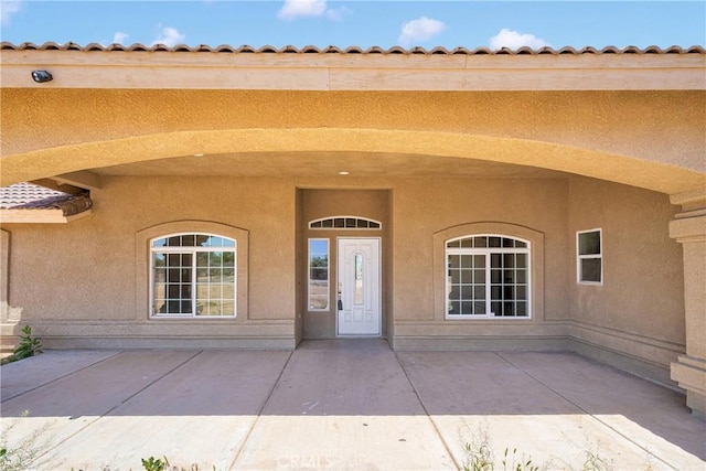11569 Arroyo Ave, Hesperia, CA 92345 - entrance to property with stucco siding and a patio area