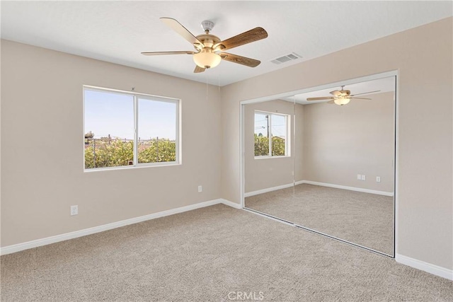 11569 Arroyo Ave, Hesperia, CA 92345 - carpeted spare room featuring a ceiling fan and baseboards