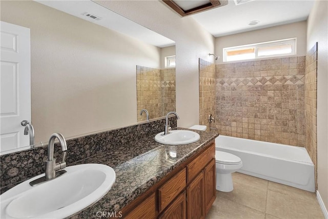 11569 Arroyo Ave, Hesperia, CA 92345 - full bath with toilet, double vanity, shower / washtub combination, and tile patterned floors