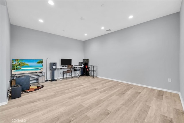 office space with baseboards, visible vents, wood finished floors, and recessed lighting