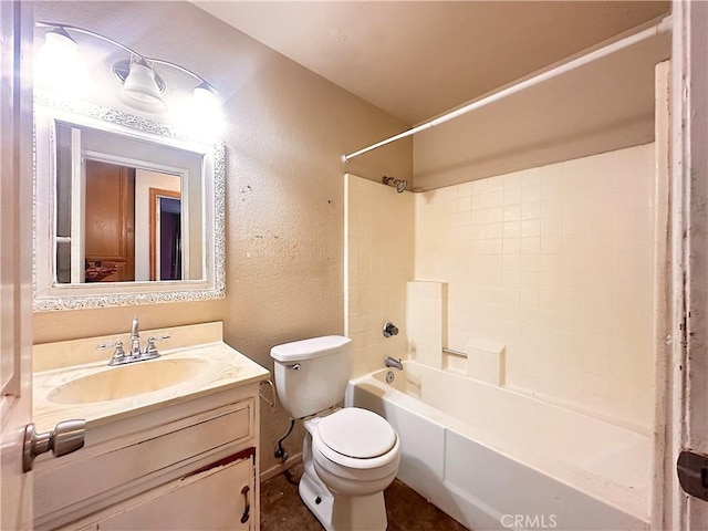 full bathroom with toilet, a textured wall, bathtub / shower combination, and vanity
