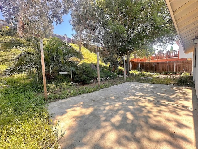 view of patio / terrace featuring fence