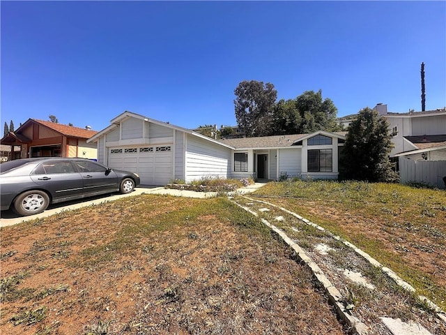 14585 Long View Dr, Fontana, CA 92337 - ranch-style home with an attached garage and driveway