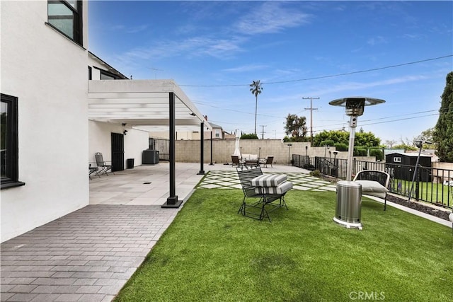 view of yard featuring a patio, a fenced backyard, and cooling unit