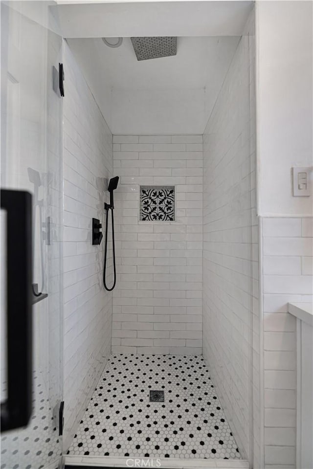 bathroom featuring a stall shower