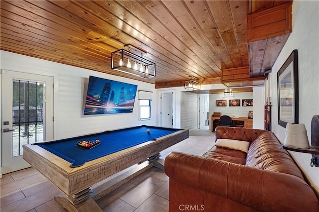 rec room featuring light tile patterned floors, pool table, and wood ceiling