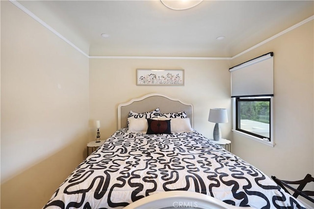 bedroom featuring crown molding