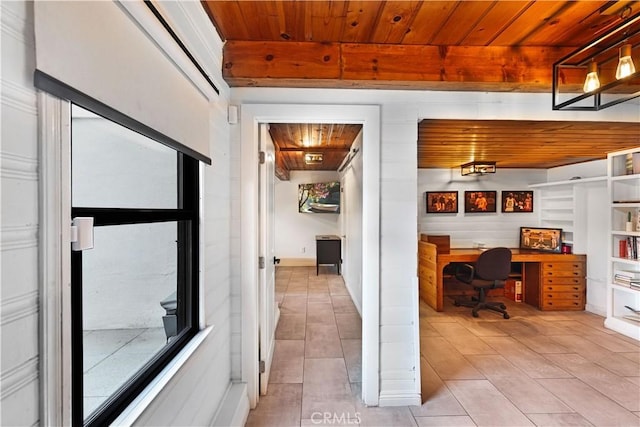 office space featuring wood ceiling and light tile patterned flooring