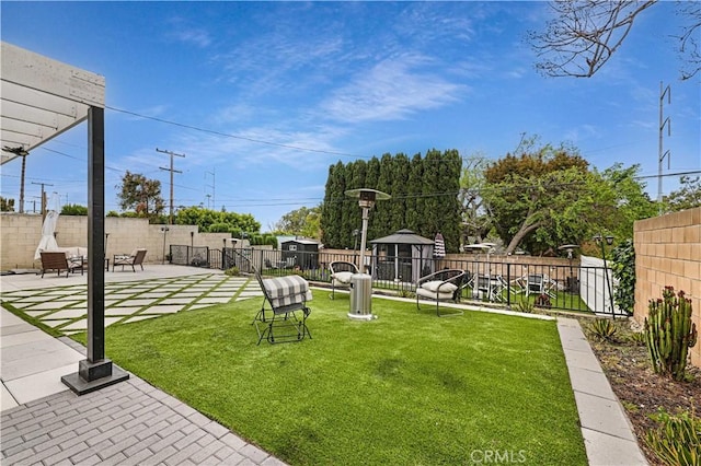 view of yard featuring a patio and a fenced backyard