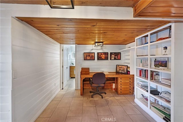 home office featuring light tile patterned flooring and wood ceiling