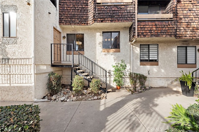 950 W Lambert Rd Unit 9, La Habra, CA 90631 - property entrance with stucco siding and a patio area