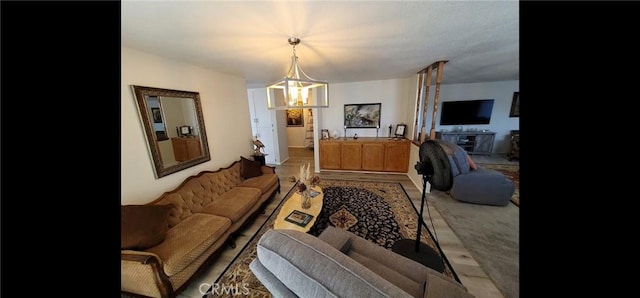 living room featuring a chandelier