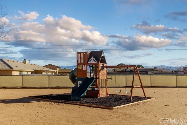 community play area featuring fence