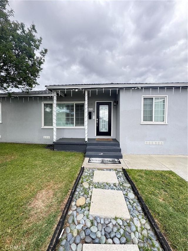 230 N Vincent Ave, West Covina, CA 91790 - view of front of house featuring a front lawn and stucco siding