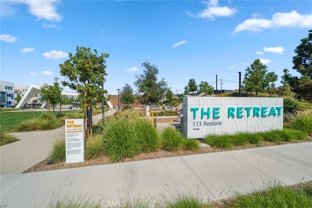 view of community sign