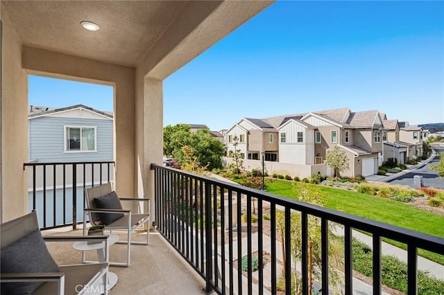 balcony featuring a residential view