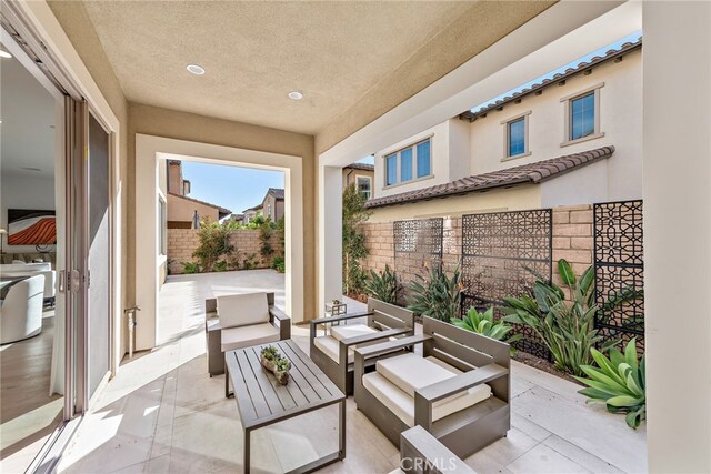 215 Sutters Ml, Irvine, CA 92602 - view of patio featuring a fenced backyard and outdoor lounge area