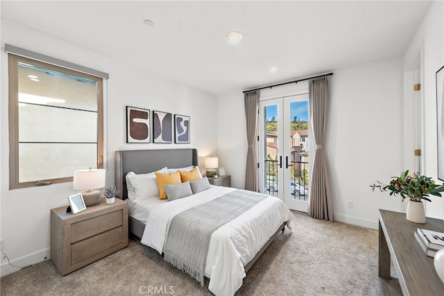 215 Sutters Ml, Irvine, CA 92602 - bedroom featuring access to outside, baseboards, french doors, and light colored carpet