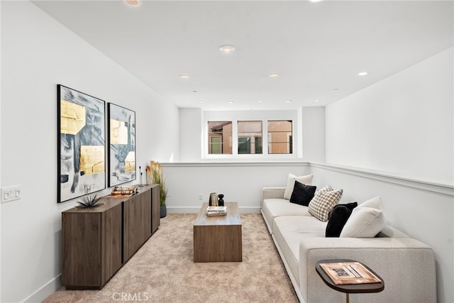 215 Sutters Ml, Irvine, CA 92602 - living room featuring baseboards, recessed lighting, and light carpet