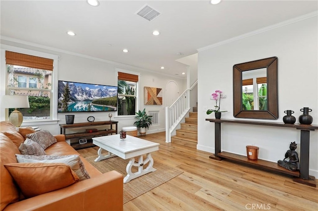 living area with crown molding, stairway, recessed lighting, and visible vents