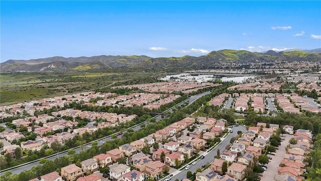 drone / aerial view with a residential view and a mountain view