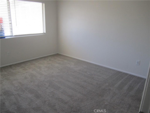 2321 S Magnolia Ave Unit 6A, Ontario, CA 91762 - carpeted spare room with baseboards