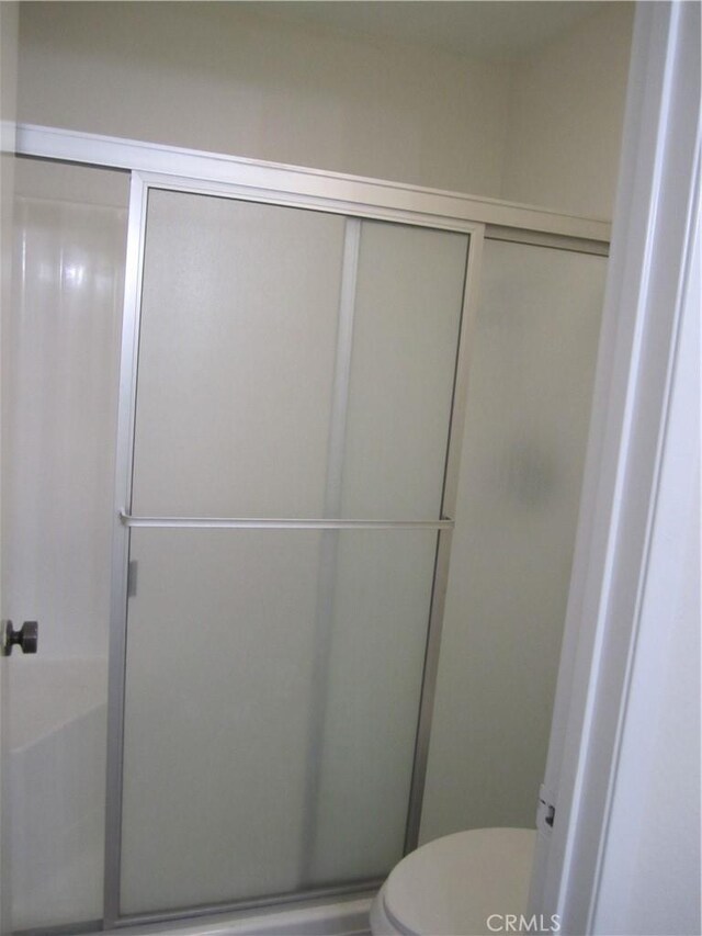 2321 S Magnolia Ave Unit 6A, Ontario, CA 91762 - full bathroom featuring a stall shower and toilet