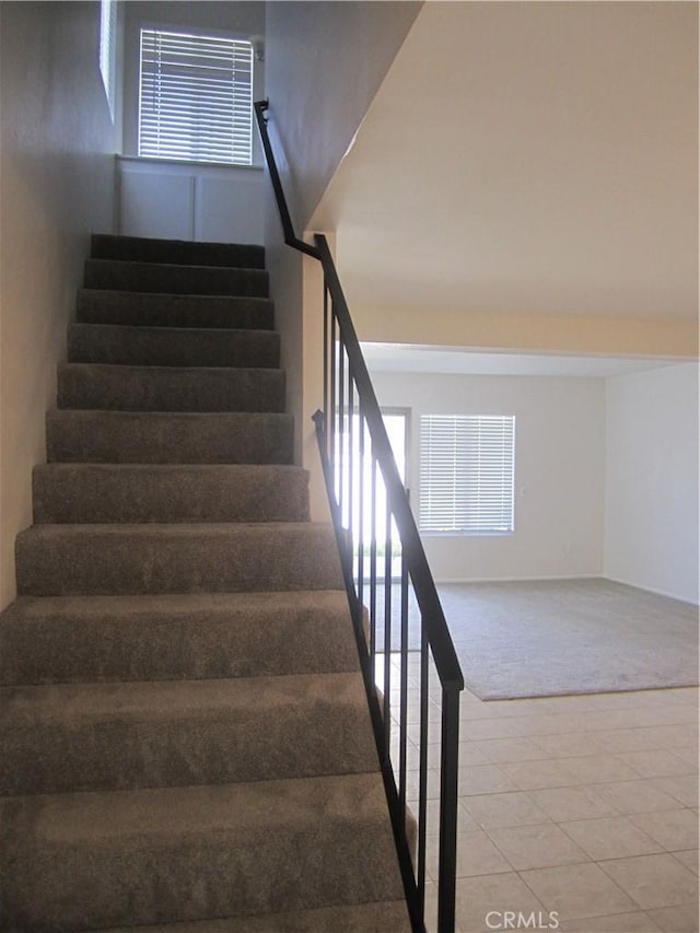 2321 S Magnolia Ave Unit 6A, Ontario, CA 91762 - stairway featuring tile patterned floors and carpet flooring