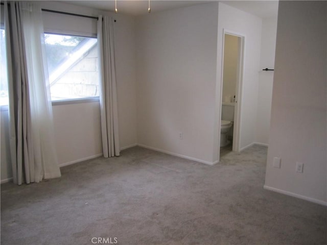 2321 S Magnolia Ave Unit 6A, Ontario, CA 91762 - unfurnished room featuring carpet flooring and baseboards