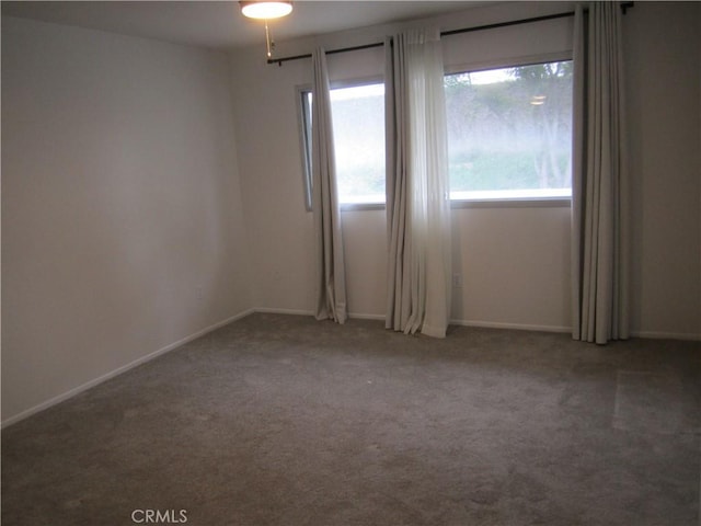 2321 S Magnolia Ave Unit 6A, Ontario, CA 91762 - unfurnished room featuring baseboards and carpet flooring