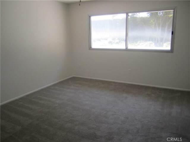2321 S Magnolia Ave Unit 6A, Ontario, CA 91762 - spare room with carpet floors and baseboards