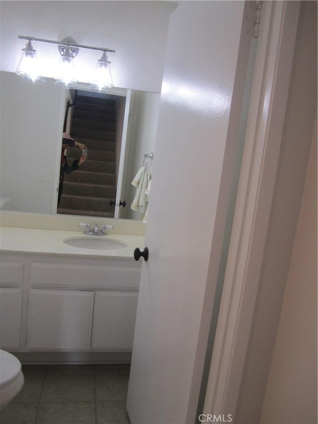 2321 S Magnolia Ave Unit 6A, Ontario, CA 91762 - bathroom with tile patterned floors, vanity, and toilet