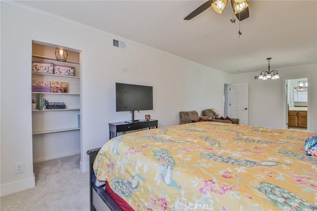 carpeted bedroom with baseboards, visible vents, ornamental molding, and ceiling fan with notable chandelier