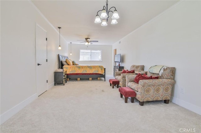 carpeted bedroom featuring crown molding, baseboards, and ceiling fan with notable chandelier