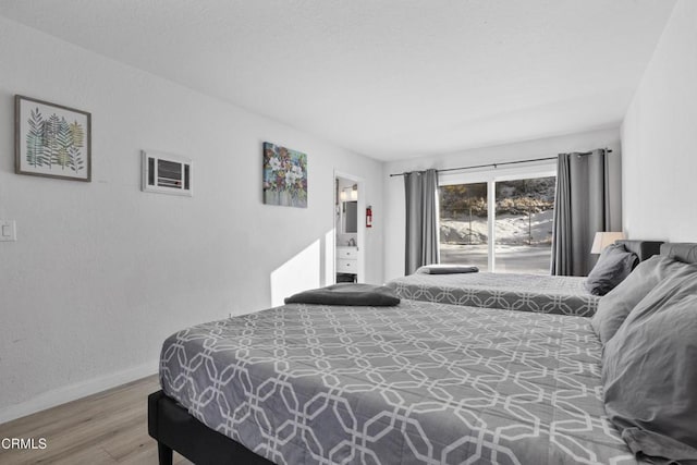 1104 E Big Bear Blvd, Big Bear, CA 92314 - bedroom with baseboards and wood finished floors