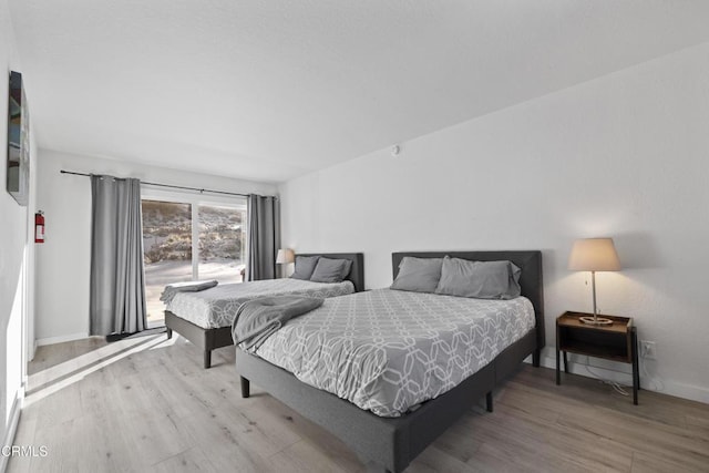 1104 E Big Bear Blvd, Big Bear, CA 92314 - bedroom with baseboards and wood finished floors