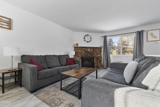 1104 E Big Bear Blvd, Big Bear, CA 92314 - living area featuring light wood-type flooring and a stone fireplace