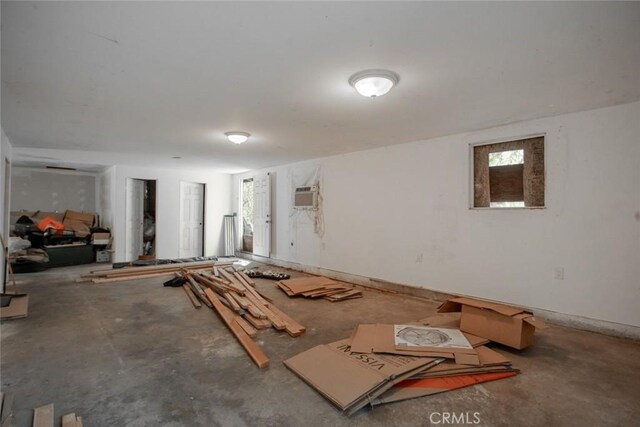 below grade area with a wall unit AC