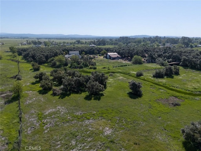 birds eye view of property featuring a rural view