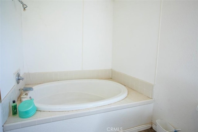 bathroom with a garden tub