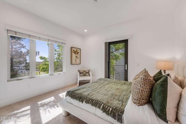 bedroom featuring carpet flooring, recessed lighting, baseboards, and access to exterior