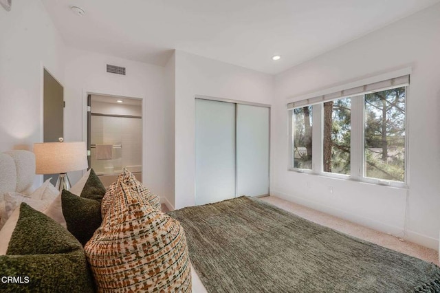 bedroom with visible vents, carpet floors, baseboards, a closet, and recessed lighting