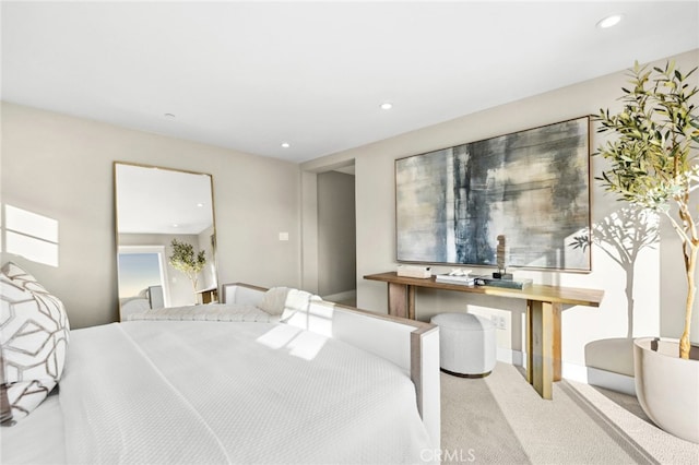 carpeted bedroom featuring recessed lighting