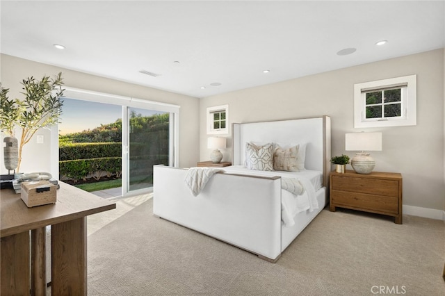 bedroom with access to outside, light carpet, recessed lighting, and visible vents