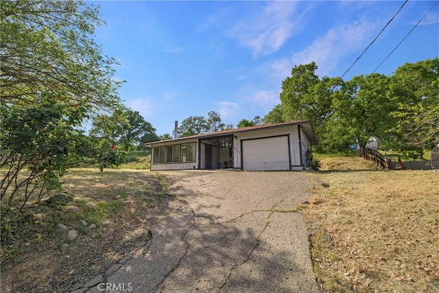 garage with driveway
