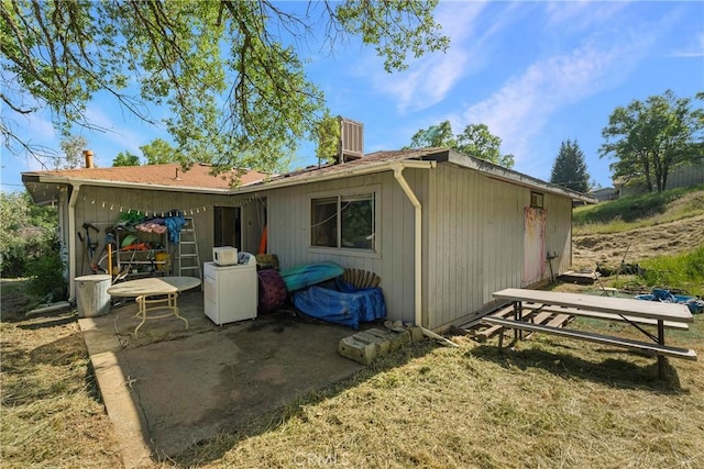 back of house featuring a patio area