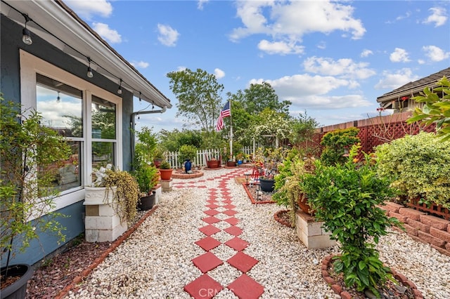 view of yard with a fenced backyard and a patio area