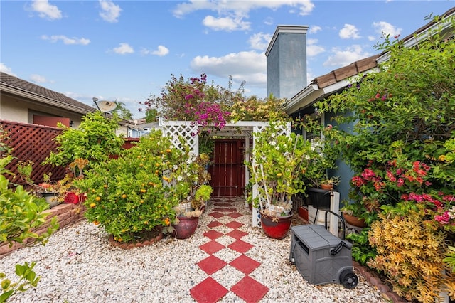view of patio / terrace featuring fence